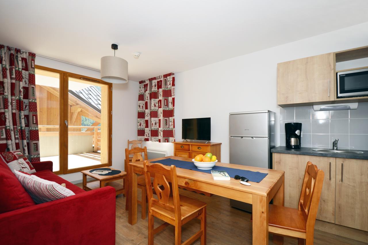 Résidence Odalys Le Crystal Blanc Vaujany Extérieur photo